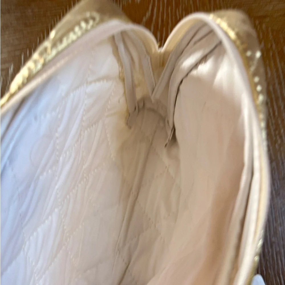 Boca Bags Inc Quilted gold cosmetic bag zip closure
